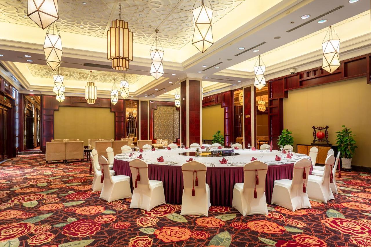 Your World International Conference Centre Иу Экстерьер фото